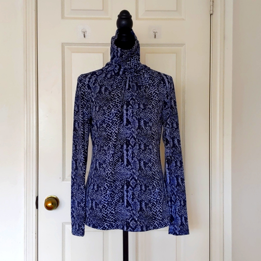 Cotton and Tencel Multicolor Pattern Long Sleeve Turtleneck Top.